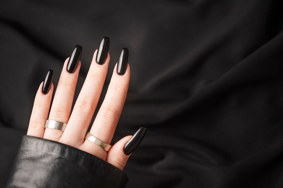 Black nail designs for 2025 featuring modern glossy, matte, and artistic styles for every occasion.